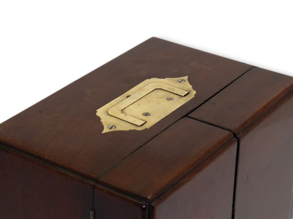 Close up of the handle on the Mahogany Apothecary Cabinet