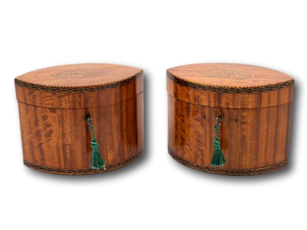 Front overview of the Georgian Pair of Satinwood Tea Caddies with the keys fitted