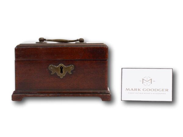 Front of the Miniature Mahogany Tea Caddy next to a standard business card for scale