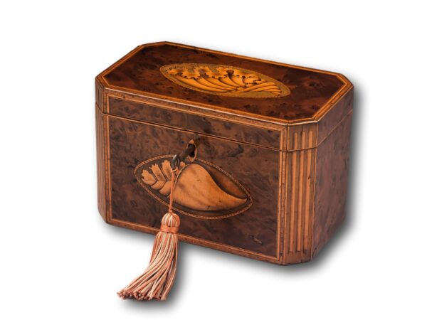 Front overview of the Burr Yew Shell Inlaid Tea Caddy with the key fitted