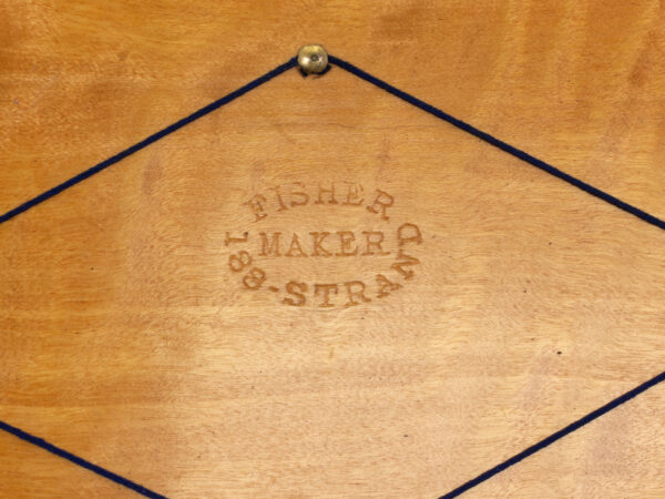 Close up of the Fisher manufacture mark on the Antique Coromandel Writing Box Fisher