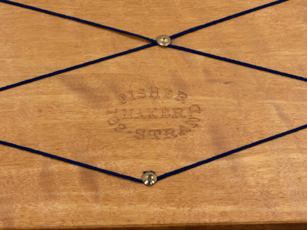 Close up of the Fisher manufacture mark on the Antique Coromandel Writing Box Fisher