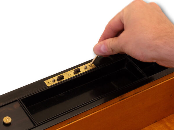 View of how to access the secret compartment in the Antique Coromandel Writing Box Fisher