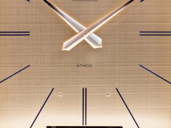 Close up of the Atmos logo on the dial