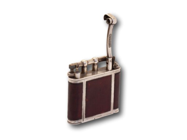 Front overview of the Dunhill Ladies Pocket Vanity Lighter with the petrol arm lifted