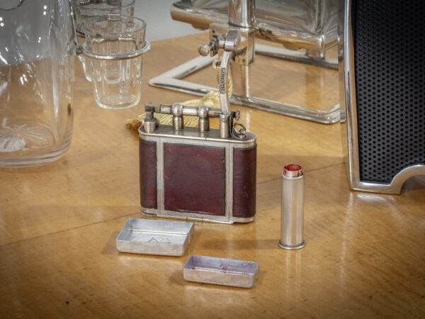 Dunhill Ladies Pocket Vanity Lighter in a decorative setting