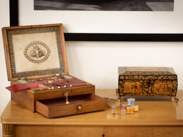 Antique Rosewood Sewing Box in a decorative setting