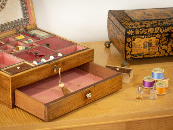 Antique Rosewood Sewing Box in a decorative setting