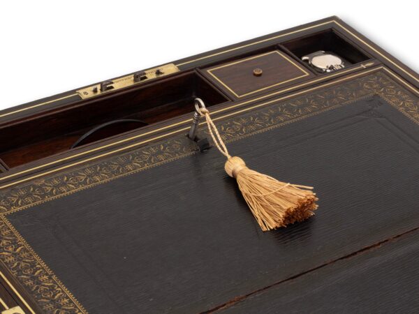 Close up of the top storage lock in the Antique Rosewood Writing Box William Chrisp