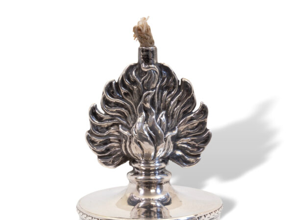 Close up of the silver flame on the Sterling Silver and Glass Grenade Table Lighter