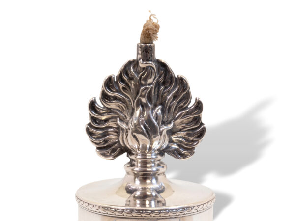 Close up of the silver flame on the Sterling Silver and Glass Grenade Table Lighter