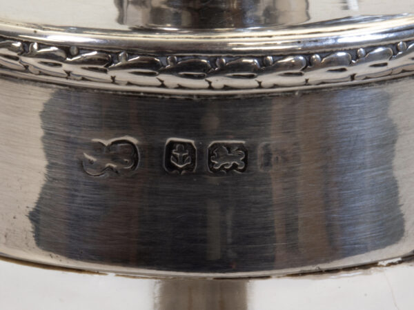 Close up of the silver hallmarks on the Sterling Silver and Glass Grenade Table Lighter