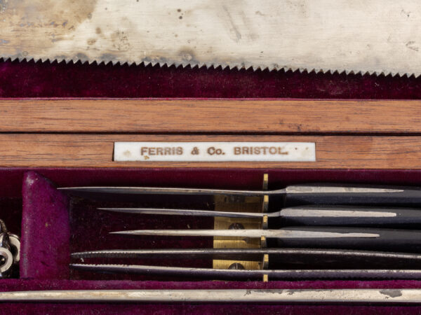 Close up of the Ferris and Co manufacture label in the Travelling Field Surgeons Box