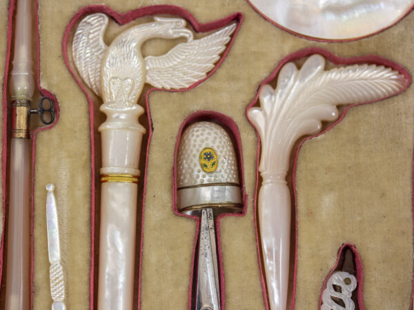 Close up of some of the tools in the Austrian Mother of Pearl Sewing Box Balthasar Wigand