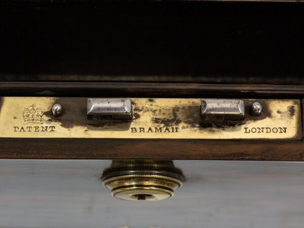 Close up of the bramah lock plate in the Coromandel Harlequin Writing Box Austin