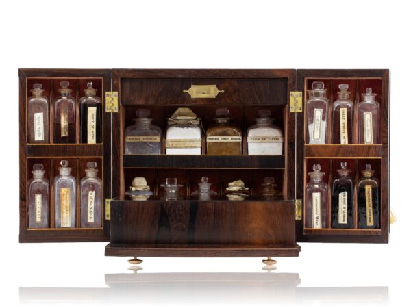 Front of the Rosewood Apothecary Cabinet open with the front dropped down