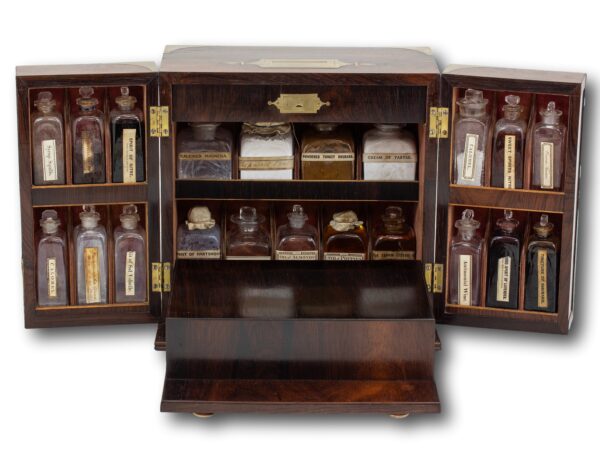 Front of the Rosewood Apothecary Cabinet open with the front dropped down