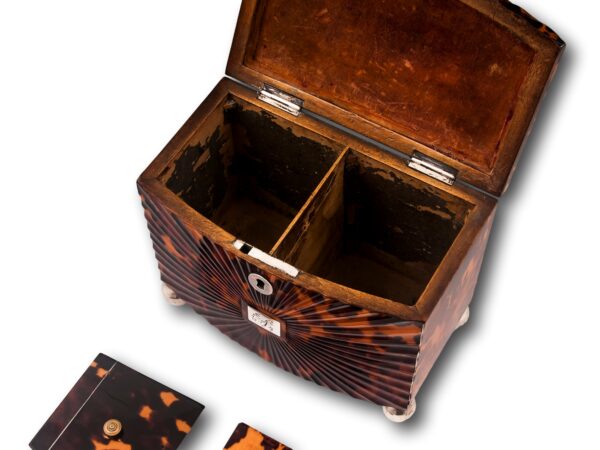 View inside the two compartments of the Starburst Pressed Tortoiseshell Tea Caddy