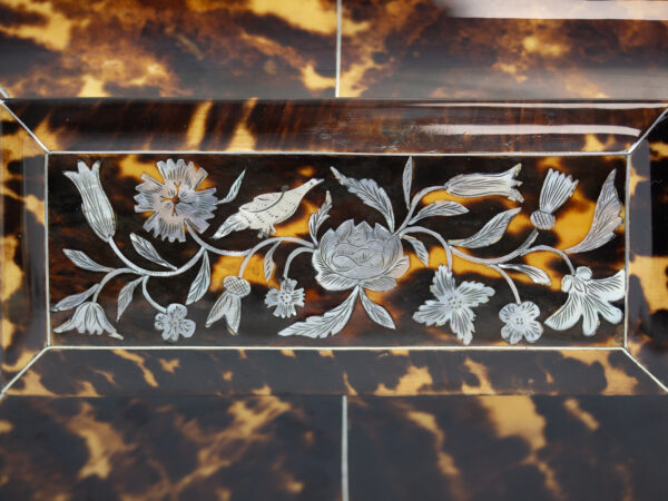 Close up of the mother of pearl decoration on the Tortoiseshell and Mother of Pearl Tea Caddy