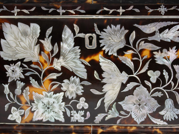 Close up of the mother of pearl decoration on the Tortoiseshell and Mother of Pearl Tea Caddy