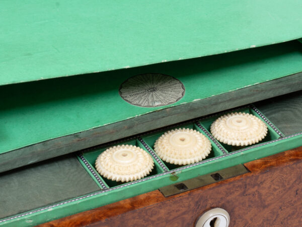 Close up of the William Dobson makers mark in the Amboyna Sewing Box