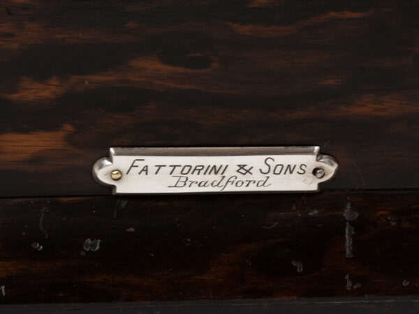 Close up of the retailers mark on the Coromandel Turntable Tantalus Betjemann