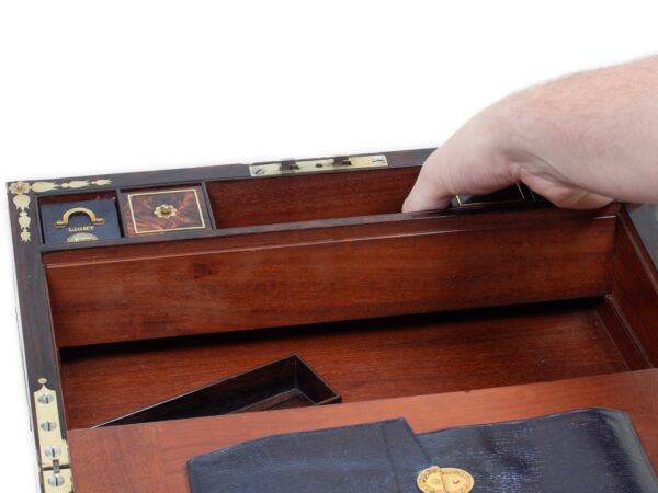 View of how to access the hidden compartments inside the Rosewood Writing Box David Edwards