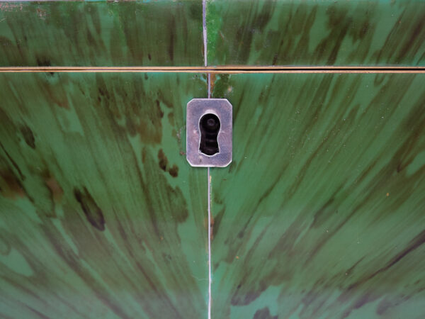 Close up of the escutcheon and book matched veneer on the Green Tortoiseshell Tea Caddy