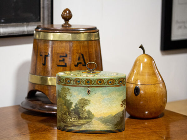 Overview of the Henry Clay Papier Mache Tea Caddy in a decorative setting