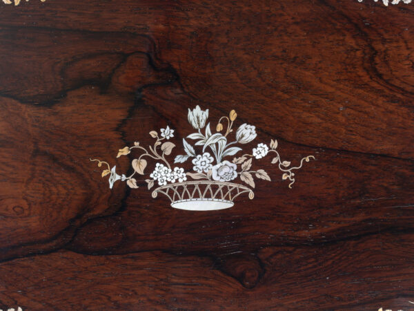 Close up of the inlaid decoration to the exterior of the Rosewood Inlaid Sewing Box