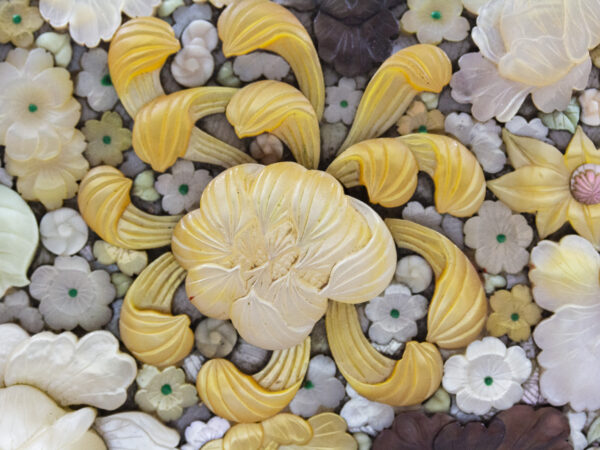 Close up of the carved flowers on the Japanese Shibayama Millefiori Box