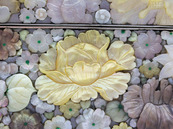 Close up of the carved flowers on the Japanese Shibayama Millefiori Box