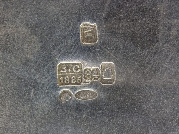 Close up of the silver hallmarks on the Russian Silver Chinoiserie Tea Caddy