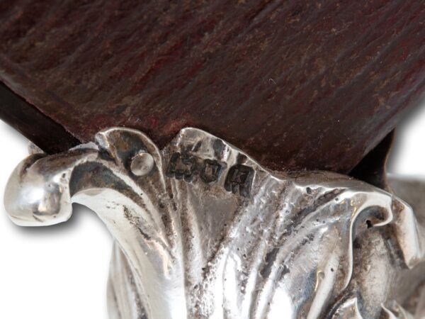 Close up of the William Comyns silver hallmarks on the feet of the Tortoiseshell and Silver Stationery Box William Comyns