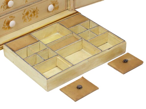 Close up of the top tray in the Chinoiserie Japanned Sewing Cabinet