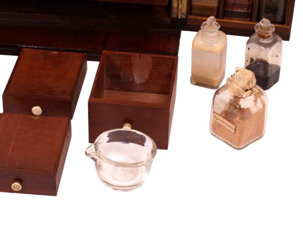 View of the drawer accessories in the Mahogany Apothecary Cabinet with Poison Compartment