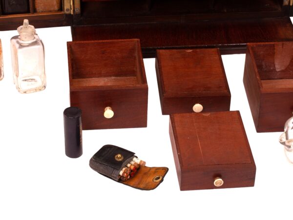 View of the drawer accessories in the Mahogany Apothecary Cabinet with Poison Compartment