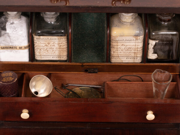 View of the drawer accessories in the Mahogany Apothecary Cabinet with Poison Compartment