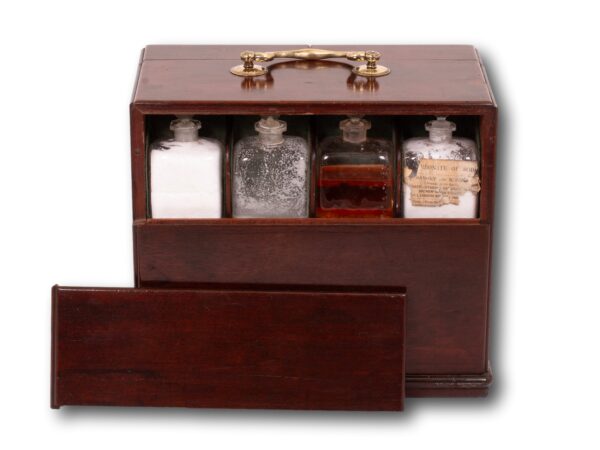 Overview of the poison compartment in the rear of the Mahogany Apothecary Cabinet with Poison Compartment