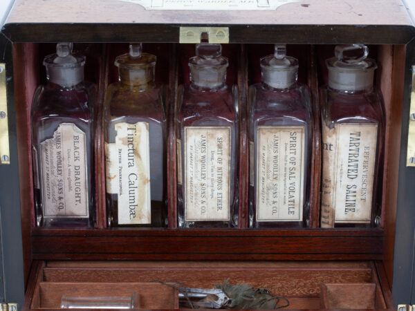 Close up of the bottles in the Mahogany Double Opening Apothecary Box