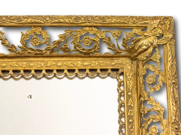 Close up of ormolu border on the French Palais Royal Musical Writing Box