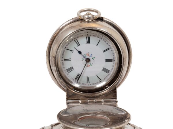 Close up of the pocket watch timepiece in the Silver Desk Inkwell Clock William Comyns