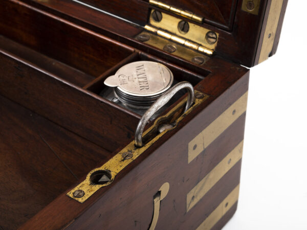 Close up of the steel lock key inside the Campaign Military Writing Box Hewlins