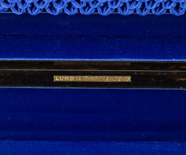 Close up of the Lund manufactures plaque in the Coromandel Sewing Box Lund