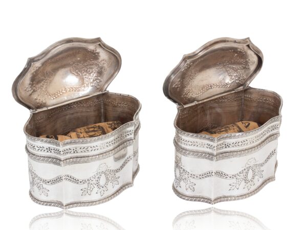 Overview of the Dutch Pair of Silver Tea Caddies with the lids up