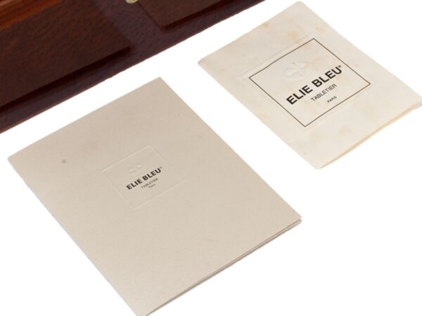 Close up of the Elie Bleu Paris Thuya Humidor manuals