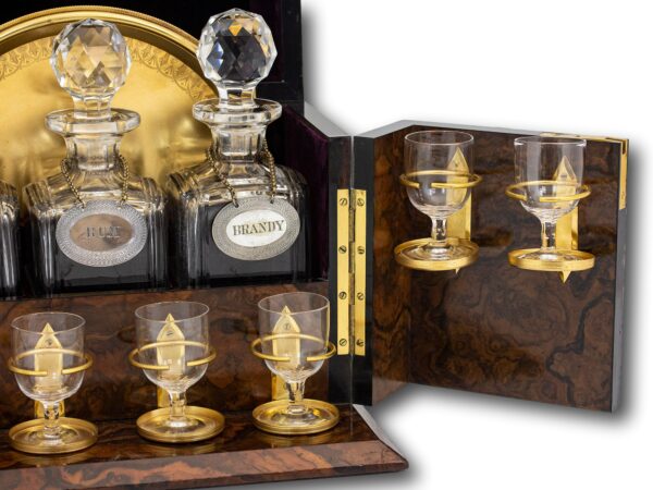 Close up of the decanter bottles and glasses inside the Feathered Burr Walnut Decanter Box Betjemann Kenneth