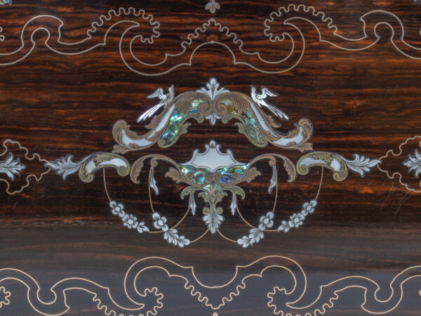 Close up of the inlaid decoration on the lid of the Coromandel Inlaid Writing Box Hausburg
