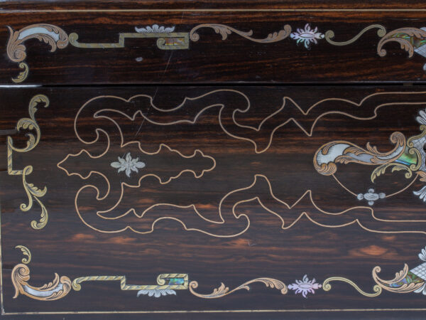 Close up of the inlaid decoration on the front of the Coromandel Inlaid Writing Box Hausburg