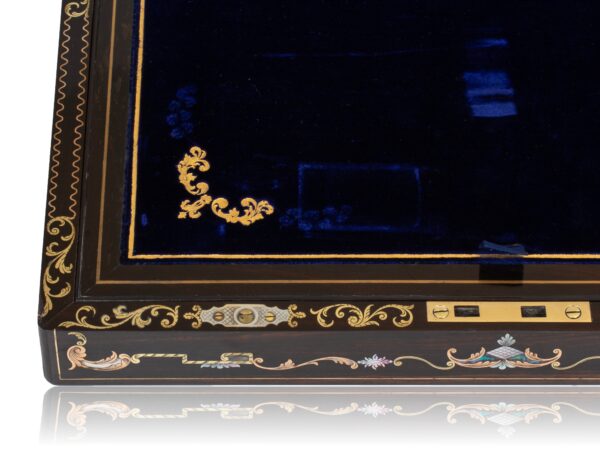 Close up of the inlaid face and gold tooled slope from the Coromandel Inlaid Writing Box Hausburg